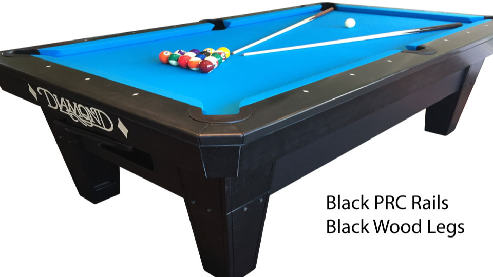 Sleek modern pool table in a sunlit living room with blue felt surface